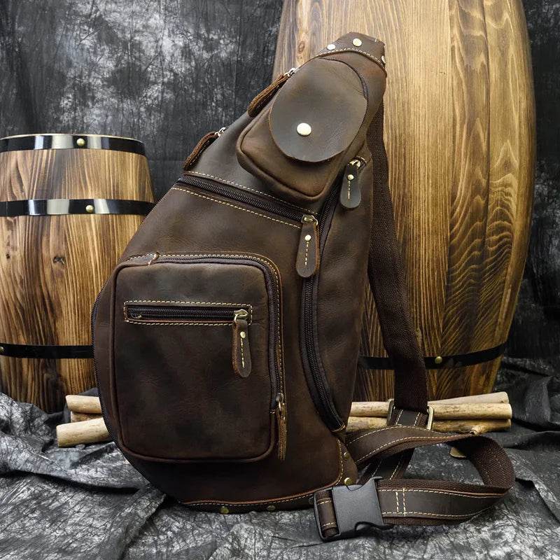 Brown VacationGrabs vintage style sling bag for men with multiple pockets and adjustable strap
