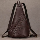 Brown vintage style sling bag for men with multiple zippers and an ergonomic design