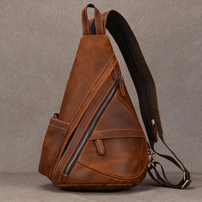 Brown vintage style sling bag for men with unique design and multiple compartments