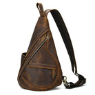Vintage style sling bag for men in brown leather with multiple zippered pockets and an adjustable strap