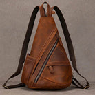 Brown vintage style sling bag for men with adjustable straps and multiple zippered pockets