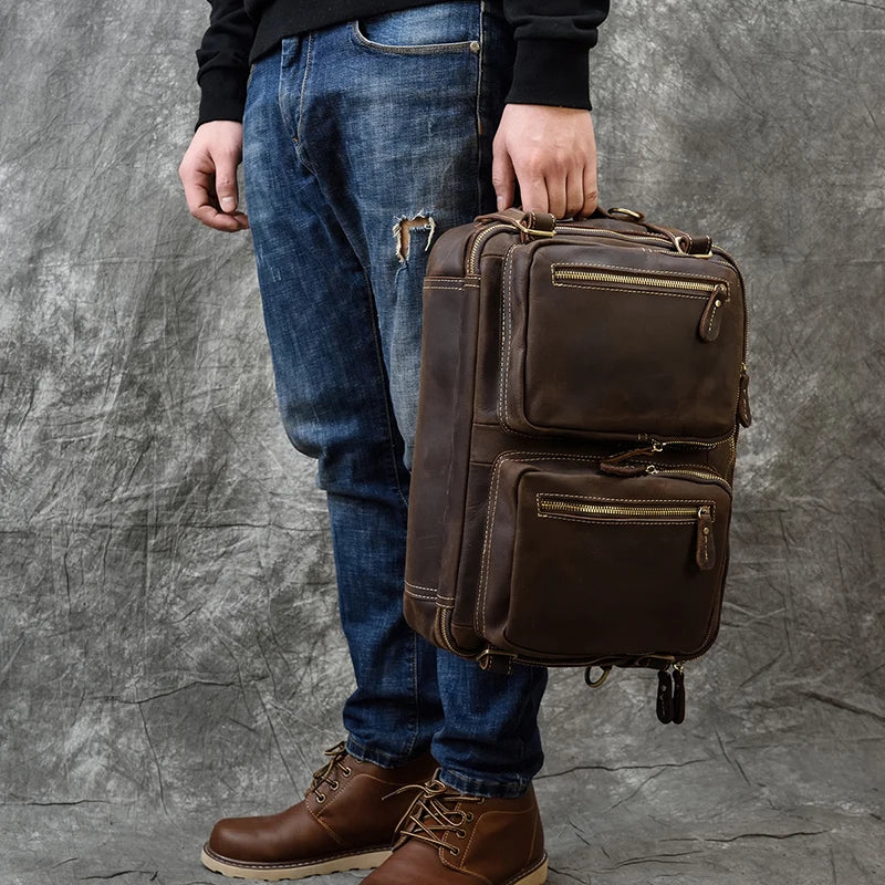 Man in jeans holds brown leather professional bag with multiple zip pockets High Quality Leather Professional Bag 3 Ways to Use .