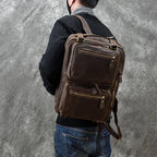 Brown vintage leather convertible backpack with front pockets on model High Quality Leather Professional Bag 3 Ways to Use .