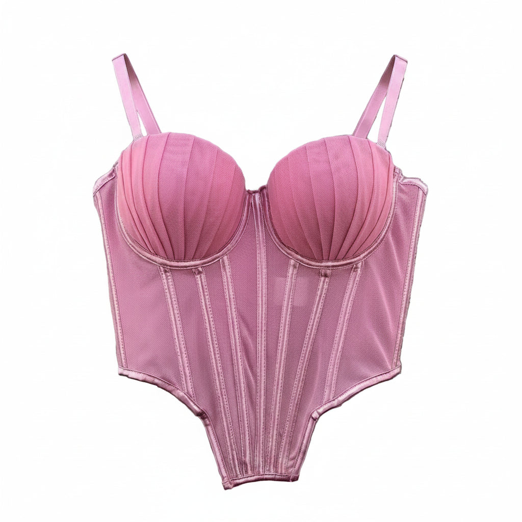 Pink sexy clubwear bustier shirt with structured cups and adjustable straps hanging on wooden hanger