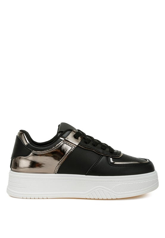 Women's black sneakers with metallic accents, perfect walking shoes for sightseeing tours