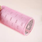 Pink no heat hair rollers for women, ideal for gentle styling