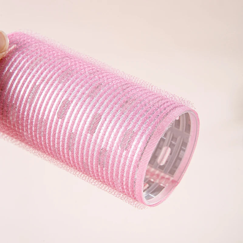 Pink no heat hair rollers for women, ideal for gentle styling