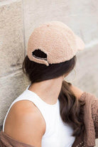 Aili's Corner Warm boucle ball cap in soft beige, perfect for stylish winter outings