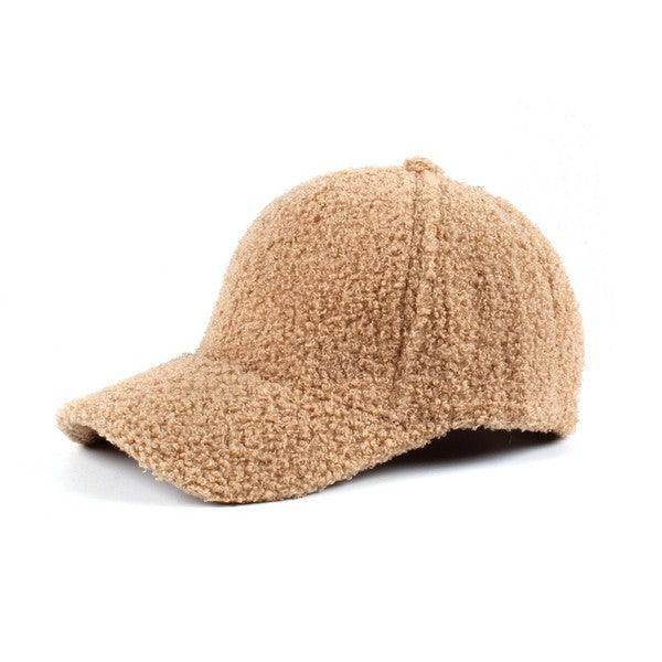 Aili's Corner Warm boucle ball cap in tan color, perfect for winter fashion and cozy styling.