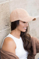 Stylish women's warm boucle ball cap in soft fabric for casual outfits and comfort