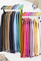 Colorful La Miel Women's Warm Vacation Jacket collection hanging on display with various shades