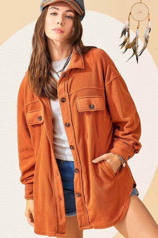 La Miel Warm Vacation Jacket in Orange with Button Closure and Patch Pockets for Stylish Getaways