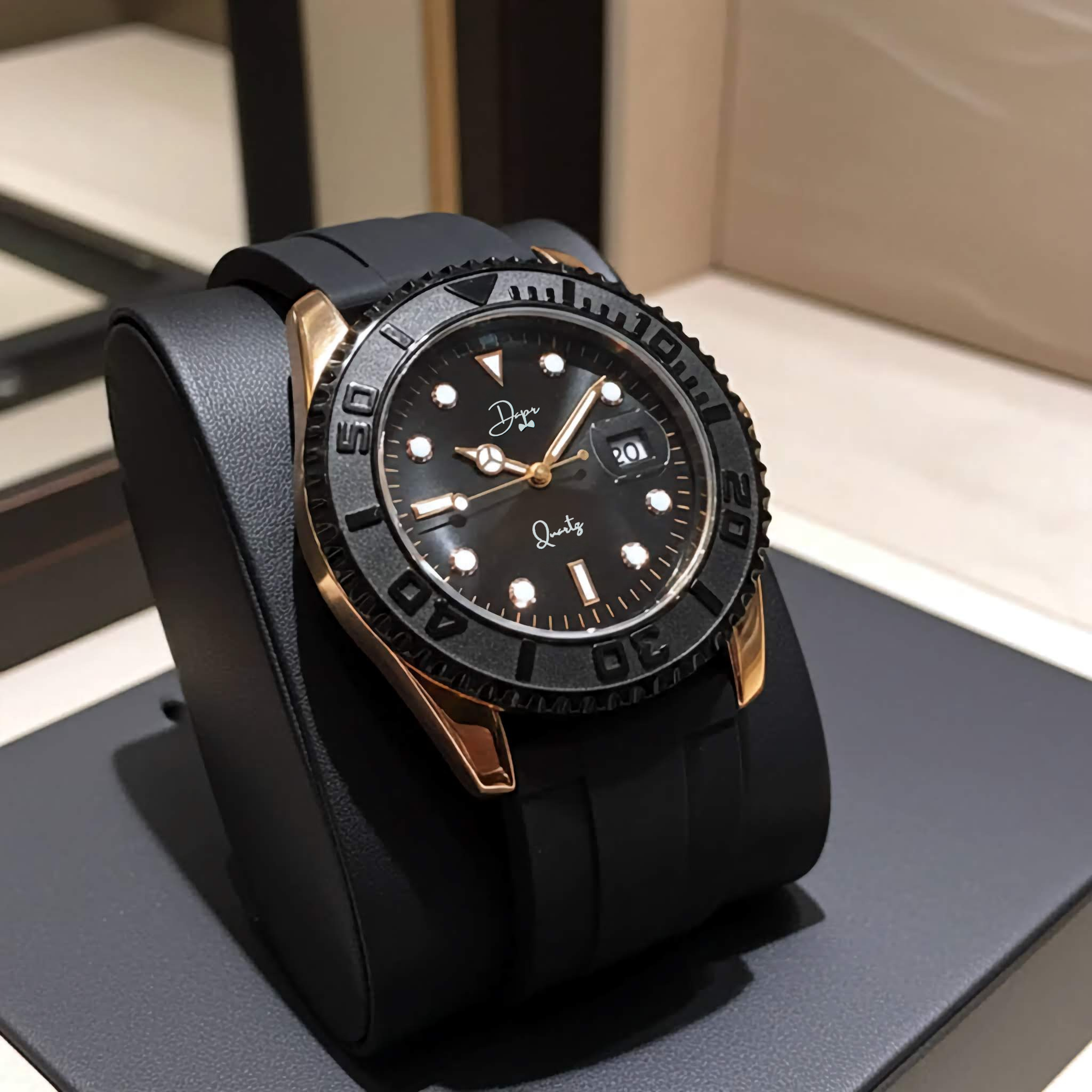 Black and gold watch on a stand with a neutral background