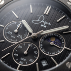 Dapper men's watch with black dial and chronograph features