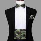 Stylish men's wedding tuxedo set featuring a leafy bow tie, pocket square, and cummerbund