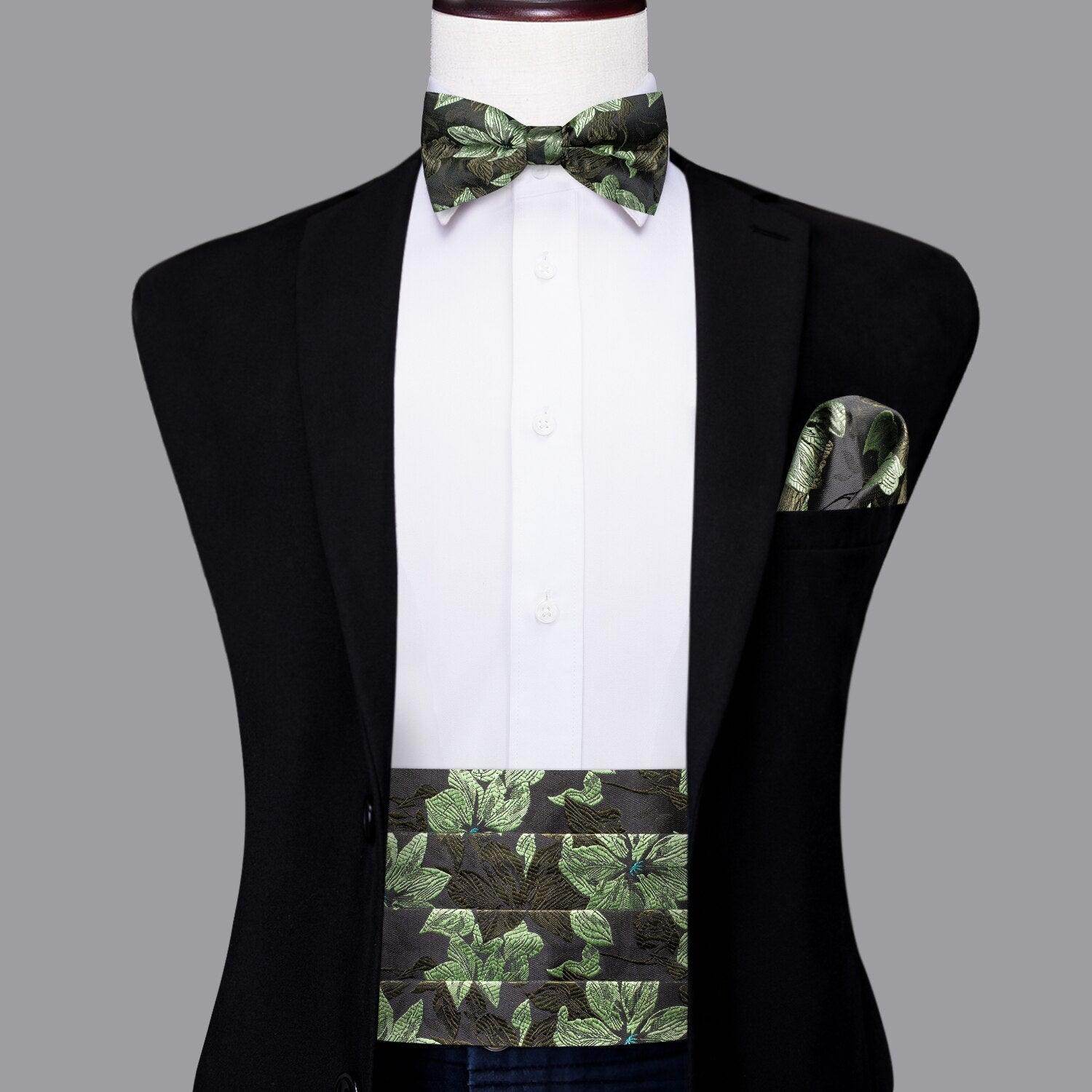 Stylish men's wedding tuxedo set featuring a leafy bow tie, pocket square, and cummerbund