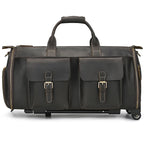 Brown leather weekend bag with multiple pockets for travel