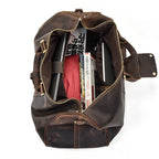 Brown leather weekend bag, spacious interior for travel essentials