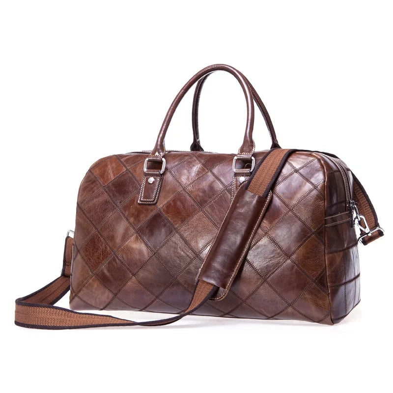 Brown leather weekend bag with adjustable shoulder strap for travel