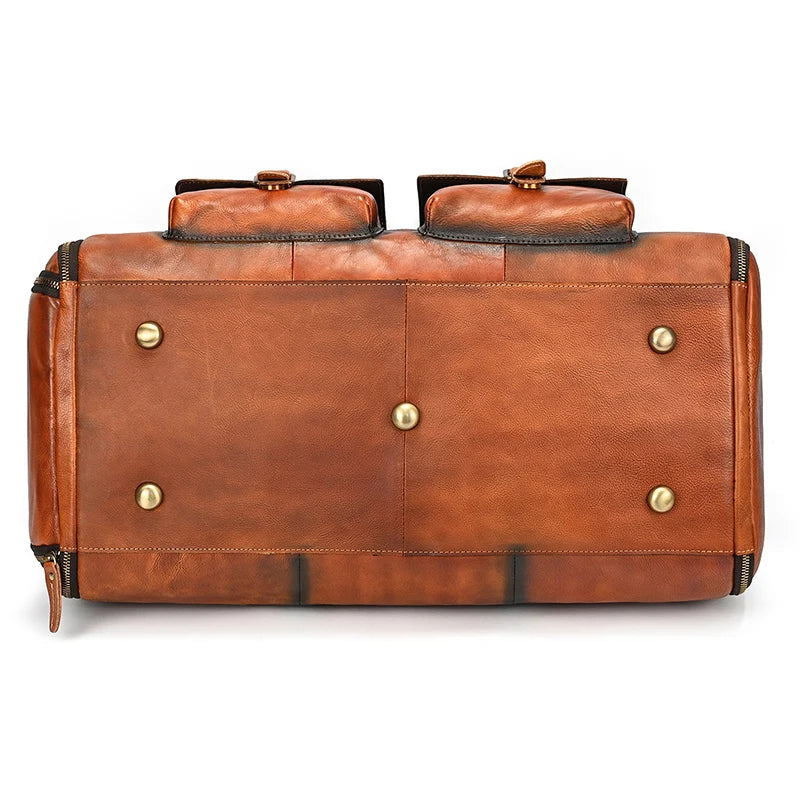 Brown leather weekender bag with durable design for travel
