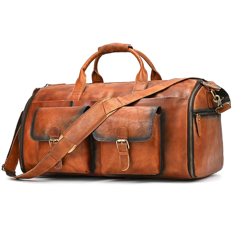 Brown leather weekender bag with multiple pockets for travel