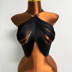 Black women's weight vest with shredded design for workouts