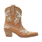 Stylish western ankle boots for women in tan with embroidered floral designs and a stacked heel