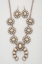 Western concho necklace for women with matching earrings featuring intricate floral design