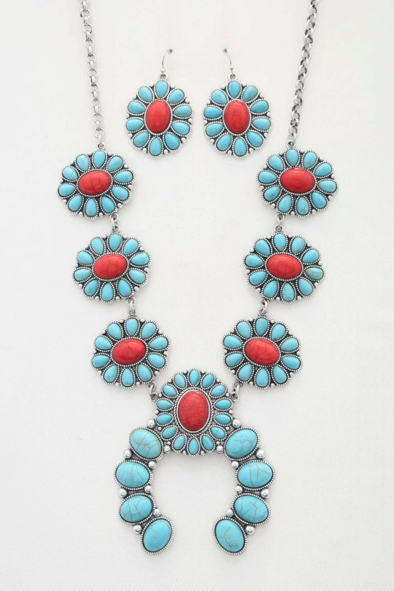 Stunning western concho necklace for women set with matching earrings in turquoise and red stones