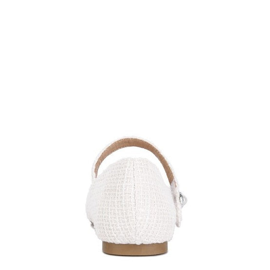 Rag Company white Mary Jane flats for women with textured fabric and buckle strap shown from the back