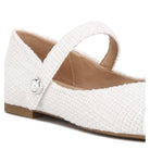 Rag Company white Mary Jane flats for women with textured fabric and pearl button strap