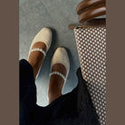 Rag Company white Mary Jane flats for women with pearl strap detail on feet