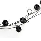 Elegant white metal fashion necklace with black faceted beads for a stylish look