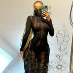 Black sheer long sleeve club dress worn by woman with braided hair taking a mirror selfie