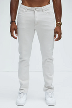 Men's slim fit vacation jeans men in white by VacationGrabs worn with white sneakers