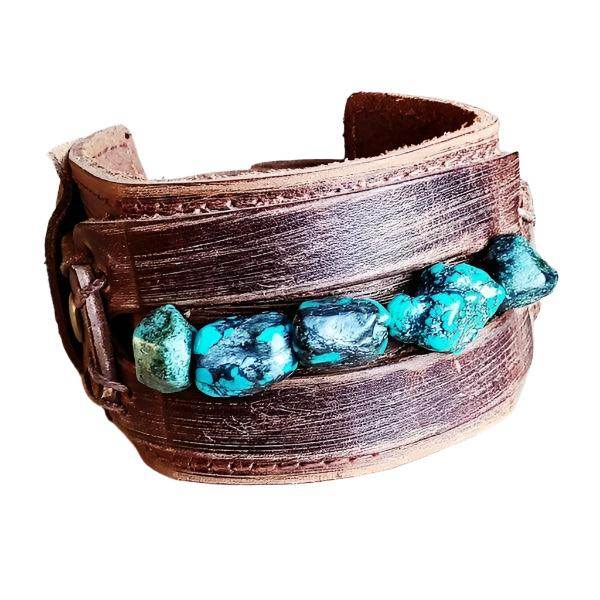 Wide cuff leather bracelet featuring turquoise stones for a trendy accessory look