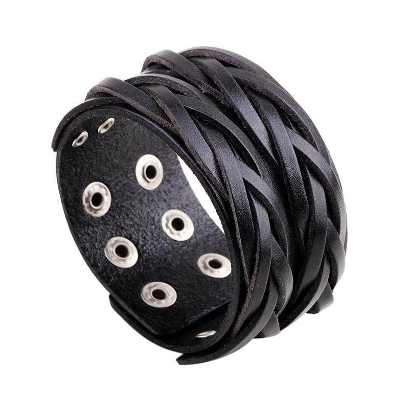 Wide cuff pu leather bracelet with braided design and silver grommets for a stylish look