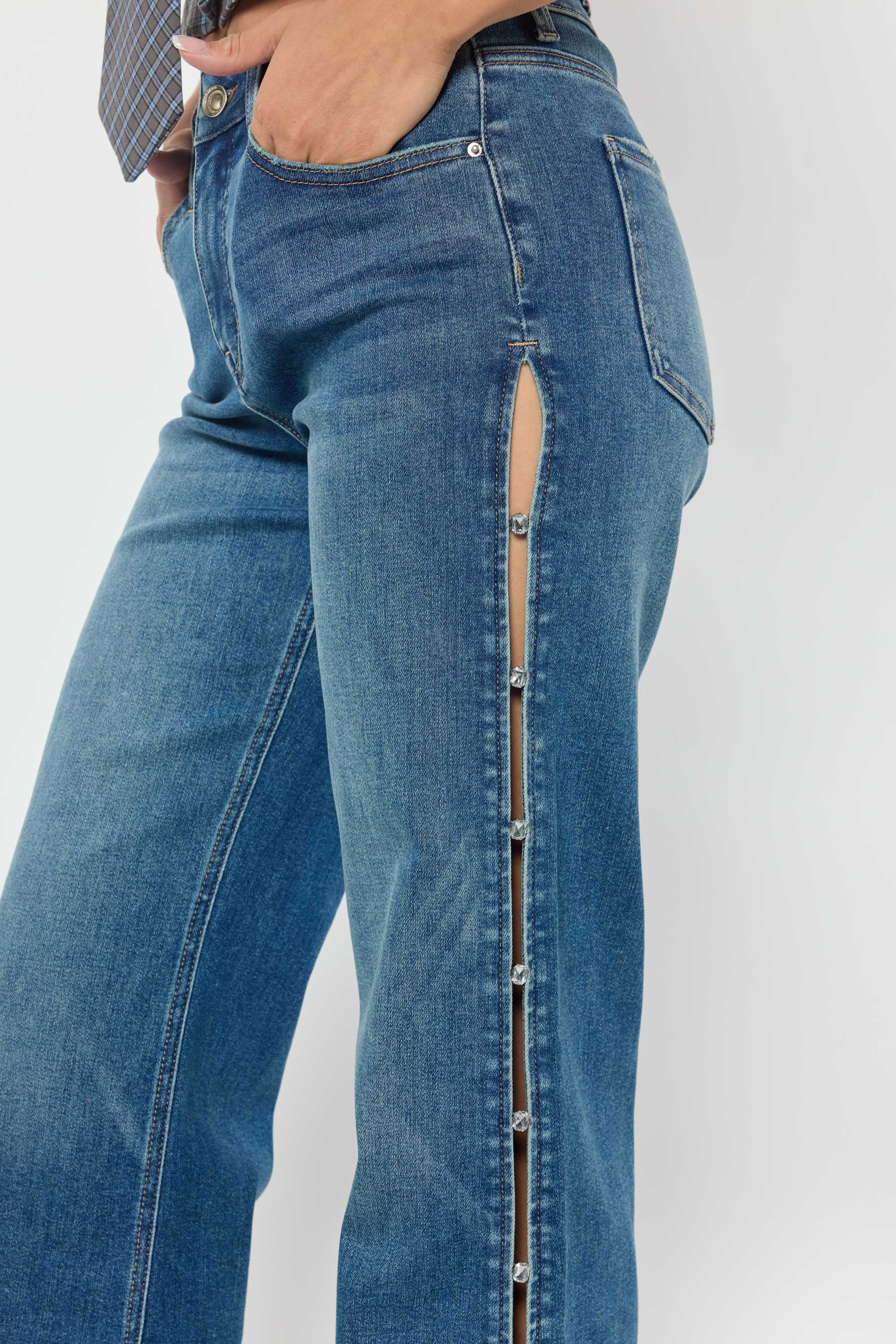 Women's blue wide-leg jeans with side button detail for casual wear