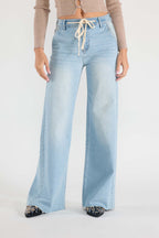 Women's light blue wide-leg jeans with drawstring detail for casual wear