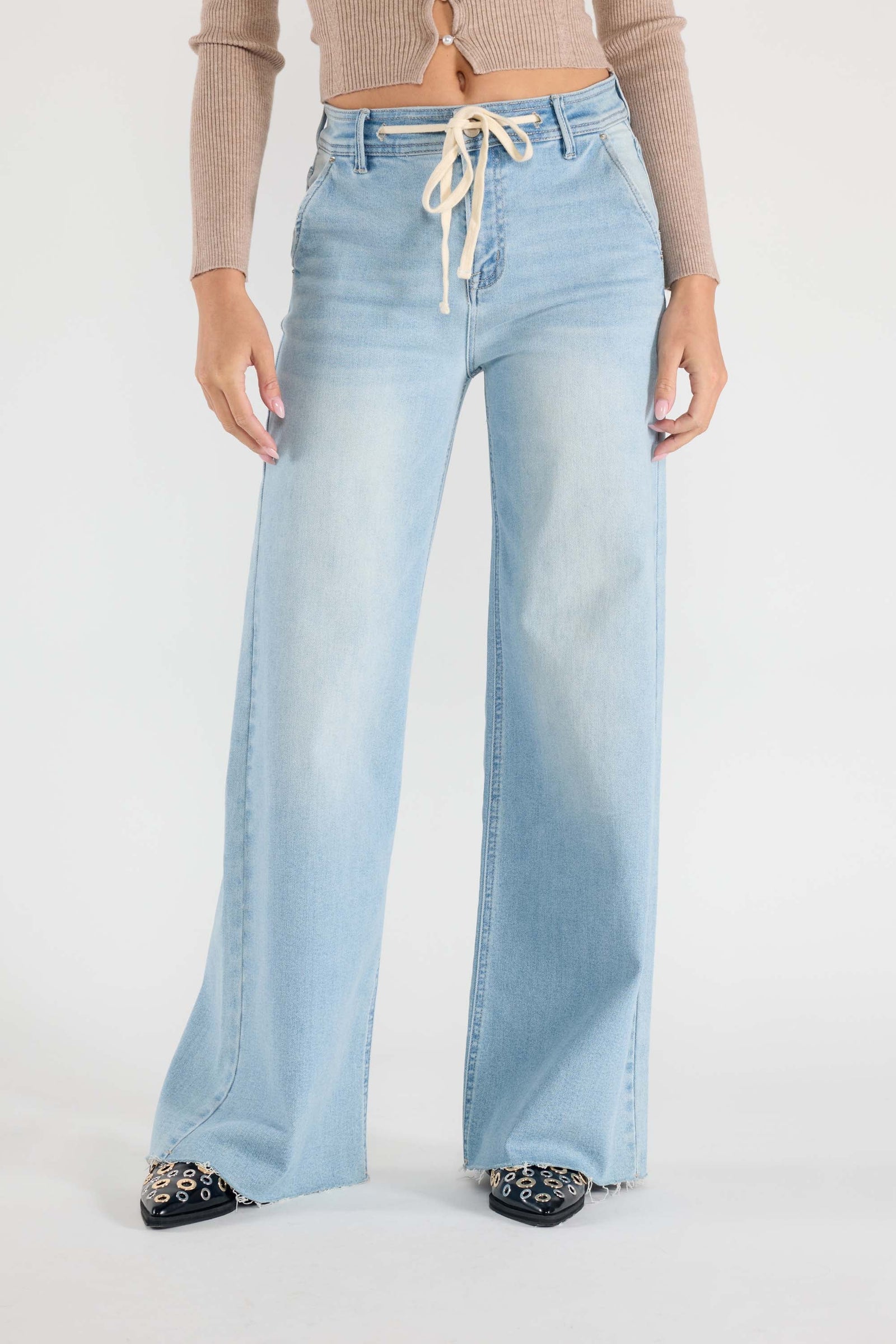 Women's light blue wide-leg jeans with drawstring detail for casual wear
