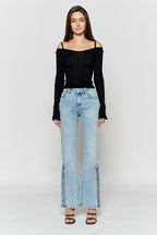 Women's light blue wide-leg jeans with stylish fringe detail