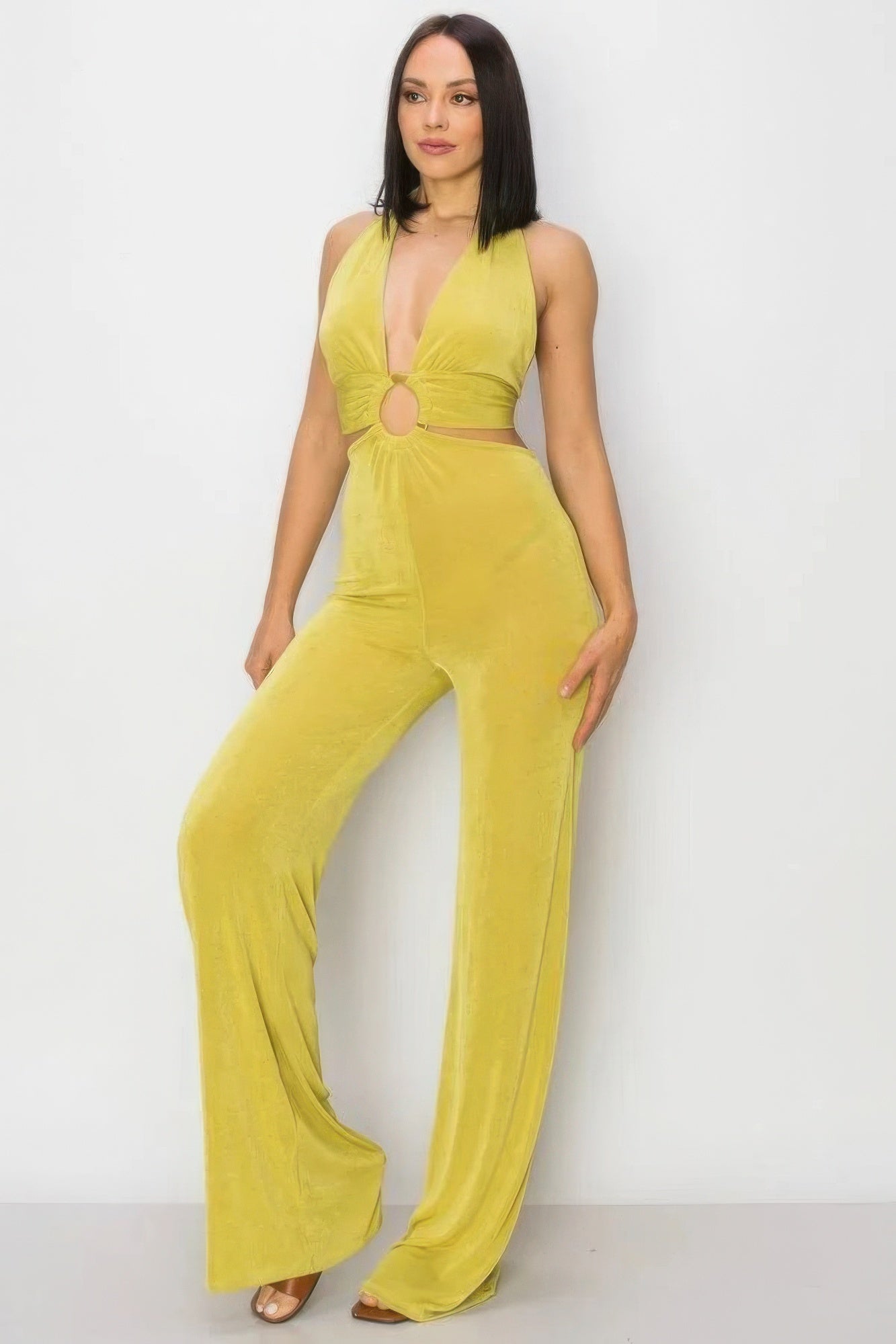 Stylish wide leg jumpsuit women in vibrant yellow with a halter neck and cutout design