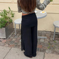 Women's black wide leg pants in lightweight, perfect for casual outings