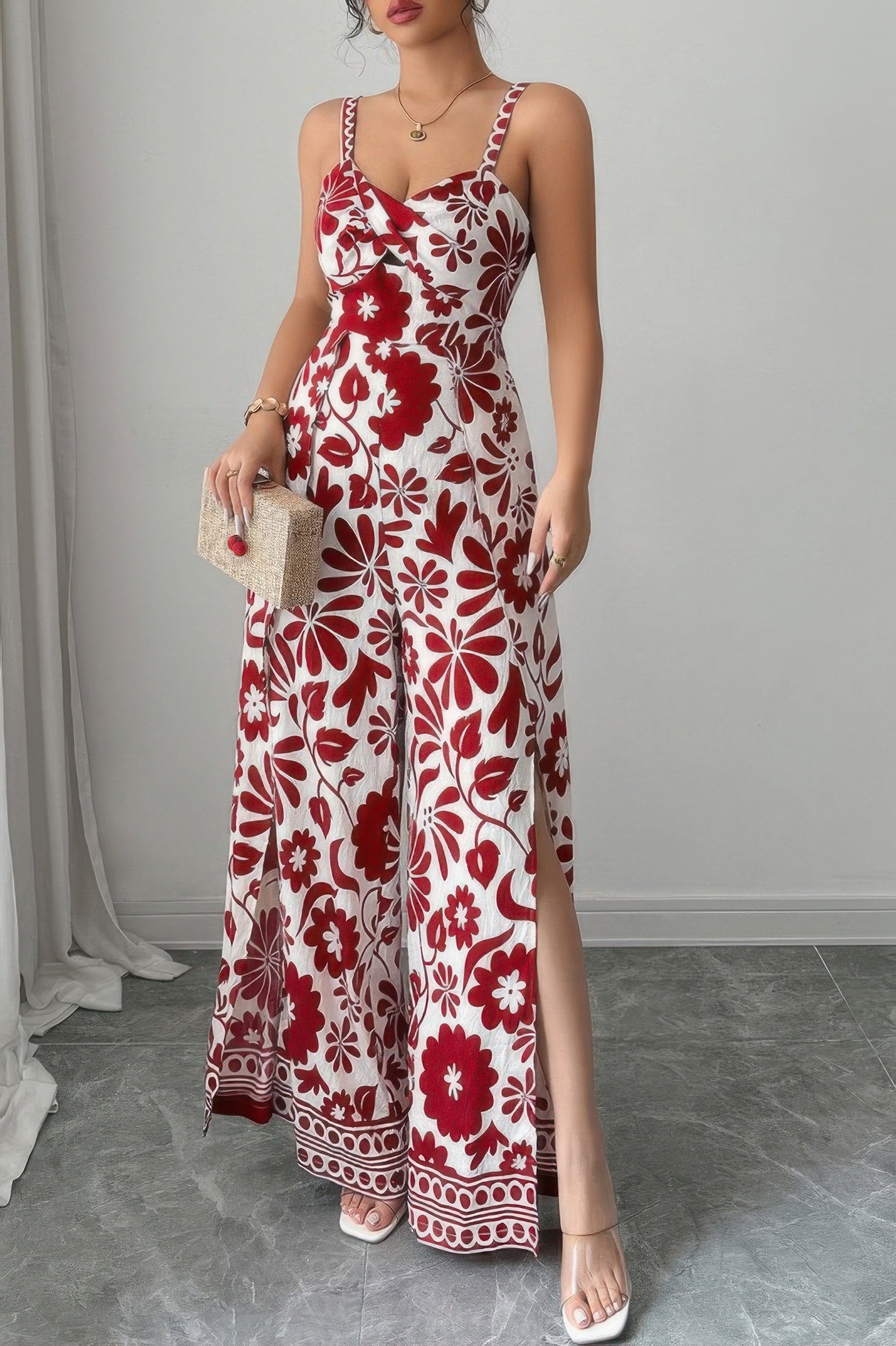 Stylish women's wide leg vacation jumpsuit in floral print, perfect for summer outings and beach events