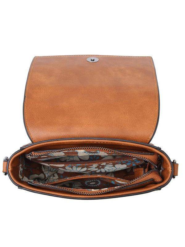 Sifides wide strap shoulder bag with a spacious interior featuring floral lining and multiple compartments