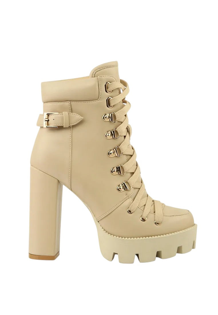 Beige platform boot with block heel on a white background