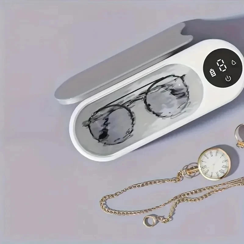 Wireless glasses cleaning machine in silver for keeping eyewear clean
