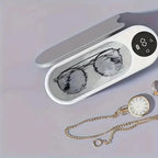 Wireless glasses cleaning machine in silver for keeping eyewear clean