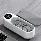 Compact white wireless glasses cleaning machine for easy lens maintenance