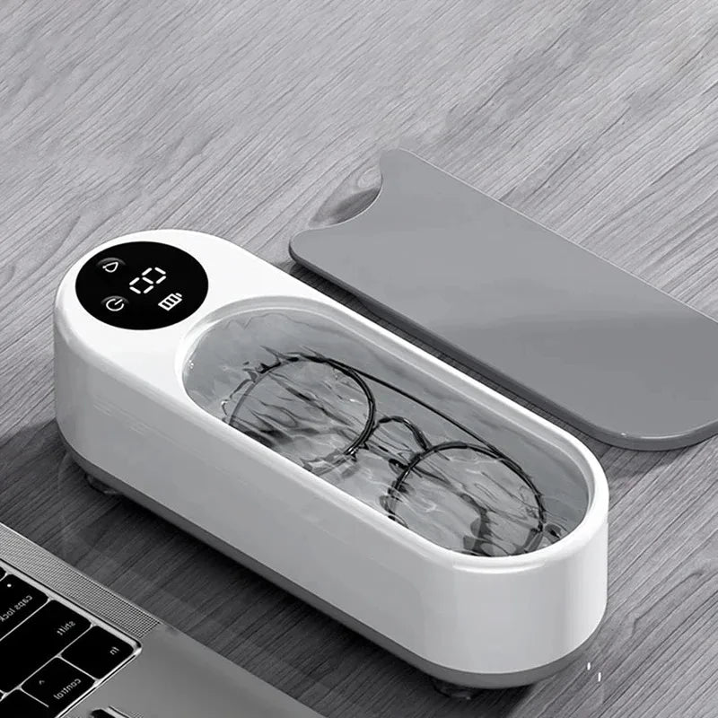 Compact white wireless glasses cleaning machine for easy lens maintenance